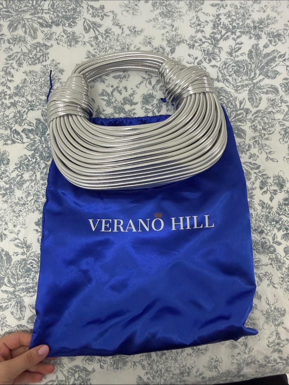 Verano Hill Silver Coil-Handle Women’s Clutch